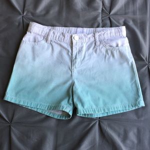 Adorable white and teal shorts.